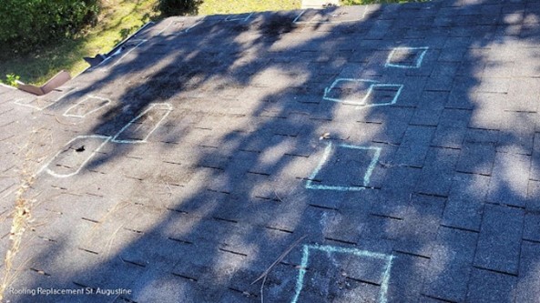Chalk markings convey areas of roof damage during your free inspection.